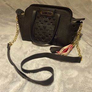 BETSEY JOHNSON PURSE WITH HEART SHAPED CUTOUTS, REMOVABLE TASSELS, ROSE PRINT.